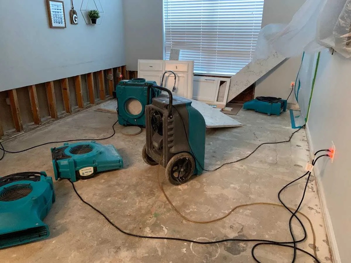 Dehumidifier in flood-cut room for Water Damage Restoration in Dartmouth